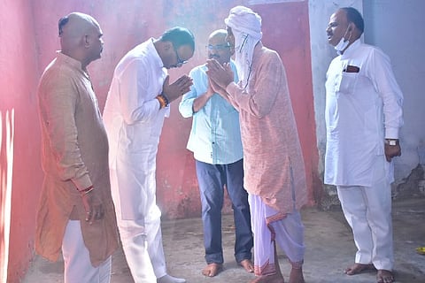 Minister Brajesh Pathak meeting with Shubam Mishra's family. Image: Twitter - @brajeshpathakup