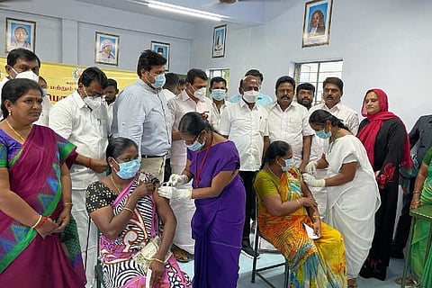 Women take their jabs during a mega vaccination camp