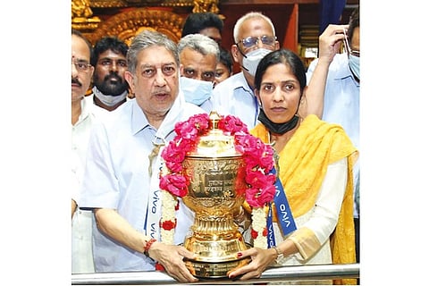 N Srinivasan and IC whole-time director Rupa Gurunath receive CSK?s IPL trophy after pooja at TTD