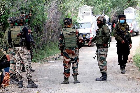 Security personnel at an encounter site in Jammu and Kashmir?s Shopian district (Image credit: ANI)