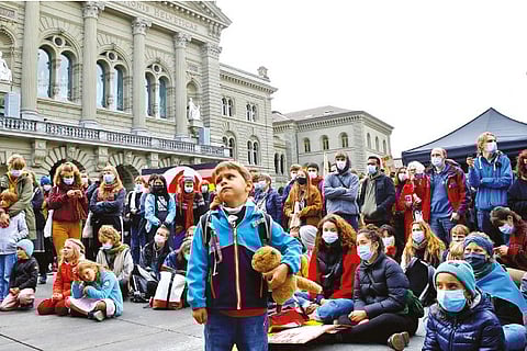 Protesters take part in Global Climate Strike at Bundesplatz square in Switzerland