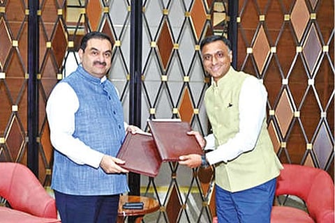 Gautam Adani (left) with Kalyan Krishnamurthy