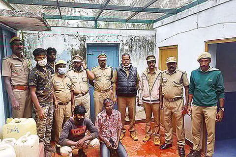 The Forest Department officials with the arrested tour guides