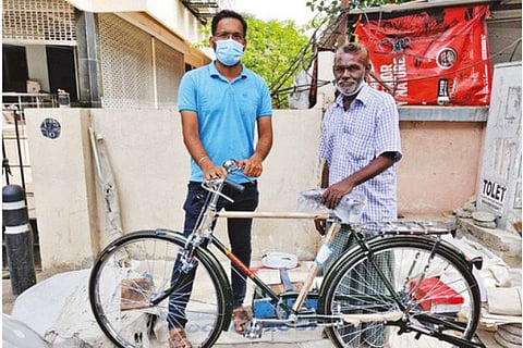 This WCCG-donated bicycle makes commute to work easier for Babu, a cobbler