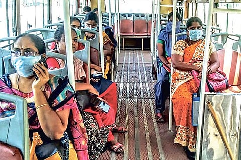 Women travelling in bus after the Covid lockdown restrictions were relaxed