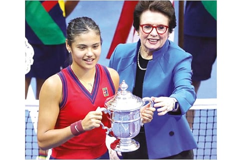 File Photo: Emma Raducanu (left) receives her trophy from Billie Jean King after winning the US Ope
