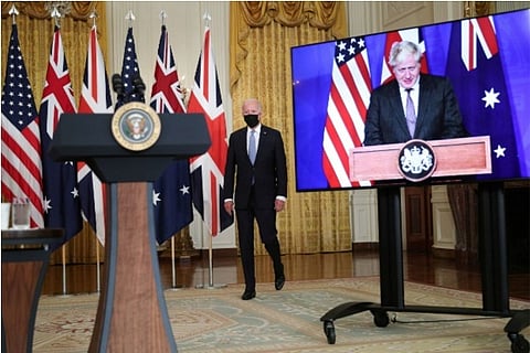 Joe Biden before a virtual meeting with Boris Johnson and Scott Morison (Reuters)