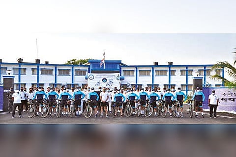 Air warriors assembled with their bicycles.