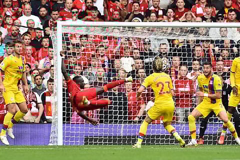 Sadio Mane takes the shot. Image Courtesy: Reuters