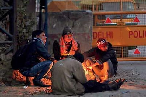 Delhi maximum temperature down by eight notches to 14.4 degrees Celsius (Credit: Reuters)