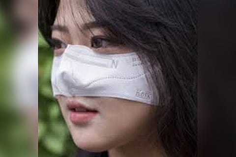 A woman wearing the kosk.