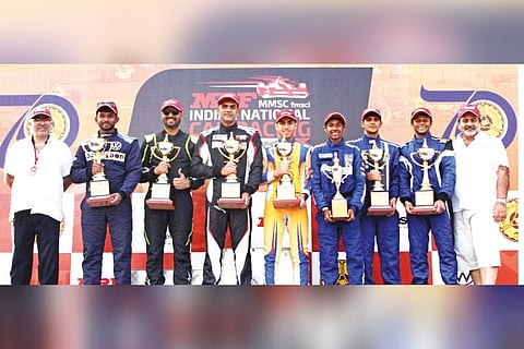 National Car Racing Championship winners pose with their trophies