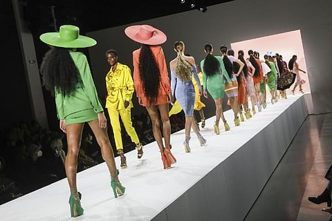 Fashion models walk the runway at the NYFW Fall/Winter 2022 Sergio Hudson fashion show (Credit: AP)
