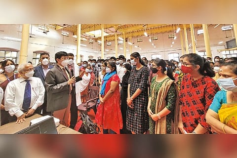 Health Secretary J Radhakrishnan interacting with first year students at MMC