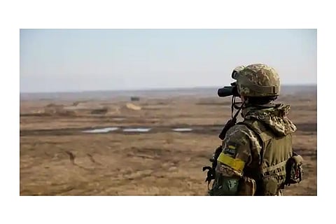 A service member of the Ukrainian armed forces takes part in tactical military exercises (Reuters)