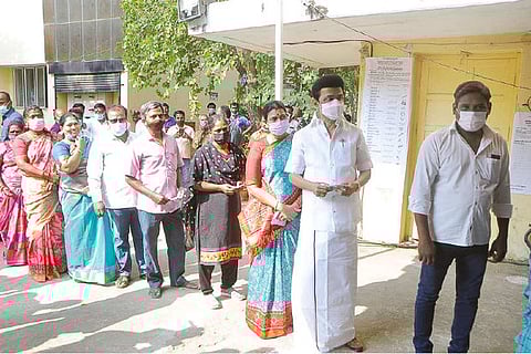 TN CM MK Stalin, wife Durga stand in queue to cast vote