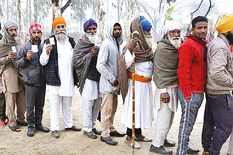 People standing in line to cast their vote