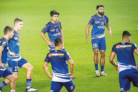 Chennaiyin FC players train at a practice session.