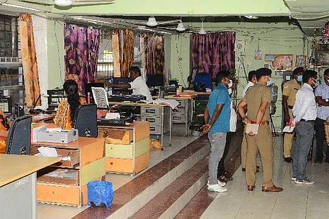 Cops during investigation at the station. Photo: Justin