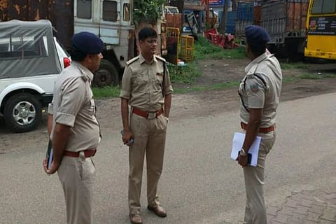 Cops at the crime scene/ Twitter