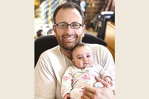 Dina Levy with her young daughter