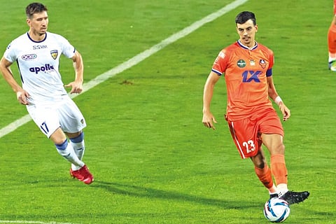 FC Goa midfielder Edu Bedia (right) and Chennaiyin FC forward Mirlan Murzaev in action