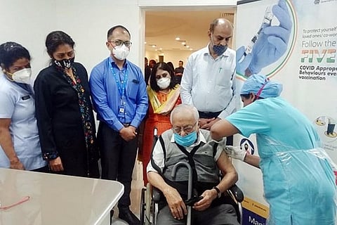An old man getting vaccinated (Source: ANI)