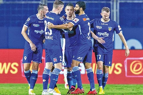 Chennaiyin FC players celebrate the opening goal.