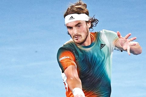Stefanos Tsitsipas fought back in the final two sets to progress