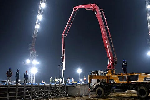 Workers during the last phase of the foundation work of the Ram Mandir in Ayodhya