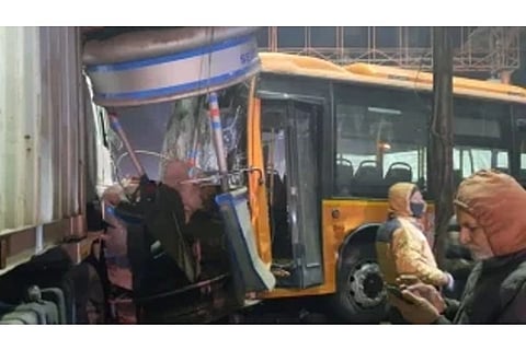 The bus ran through a traffic booth and came to a halt after hitting a truck (Image Courtesy: IANS)