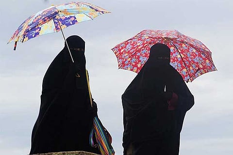 Forcing others to wear extremist garments is crime: China