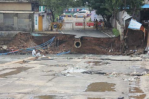 Heavy rainfall caused the river to flow over the bridge
