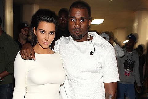 Kim, Kanye name son Saint