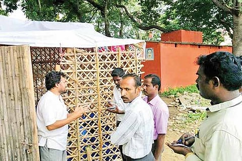 Temporary bamboo shelters being built in Salem