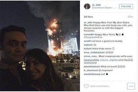 Selfie in the backdrop of fire garners flak