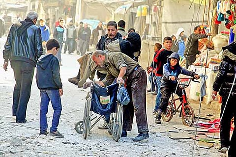 Over 300 killed in a day in ongoing massacre in Syria