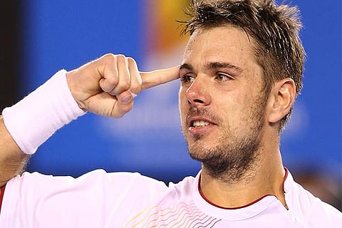 Wawrinka advances as Tursunov retires with injury