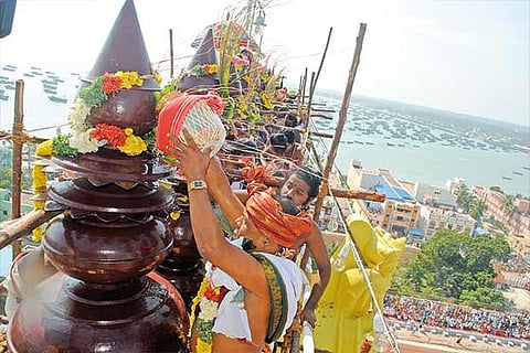 Priests carry out rituals at the Kumbabhishekam in Sri Ramanathaswamy Temple in Rameswaram