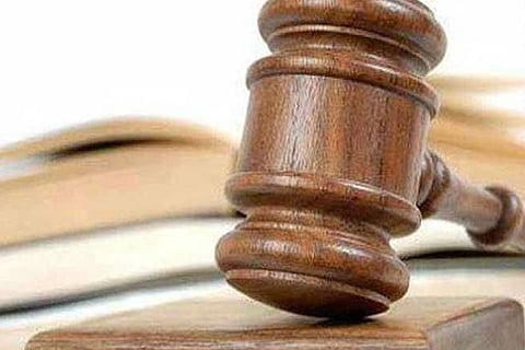 DA case: Official, son convicted sentenced