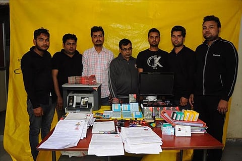 Vodafone dealer based in Haryana and six of his accomplices arrested in the city on Saturday