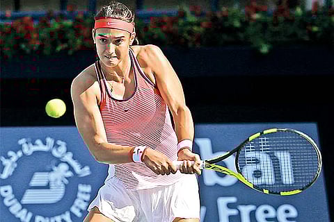Caroline Garcia in action against Andrea Petkovic in Dubai