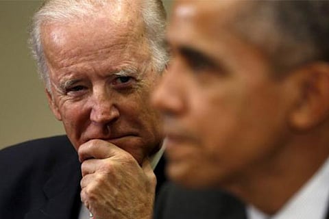 Vice President Joe Biden watches as President Obama holds a meeting with national security officials