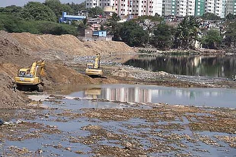 Desiliting work on at the Adyar River, near Saidapet