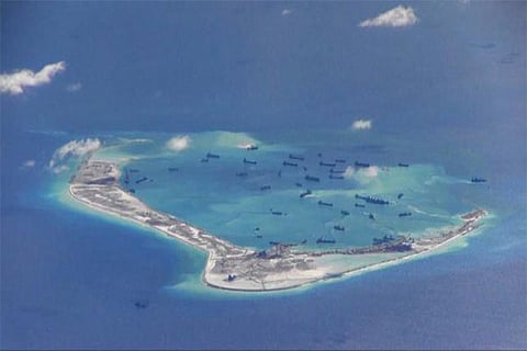 Chinese vessels seen in the waters around the disputed Spratly Islands in the South China sea