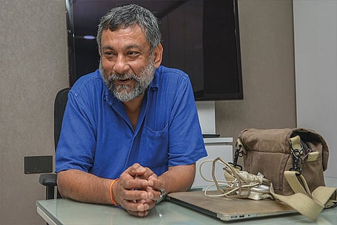 Award-winning photojournalist Pablo Bartholomew (Photo: Justin George)