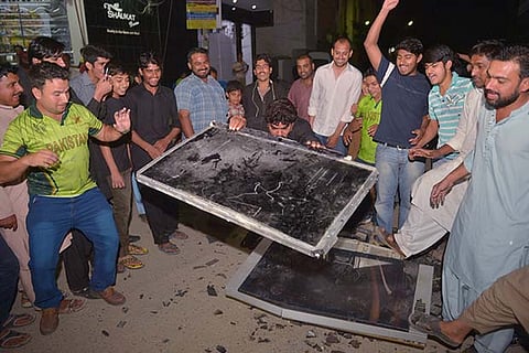 Pakistan fans break TV sets, say ‘we can never beat India'