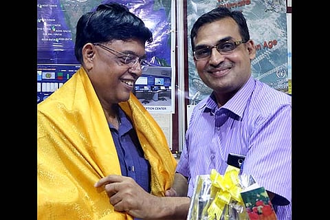 Dr S Balanchandran (right), who takes over as new weatherman, with Ramanan
