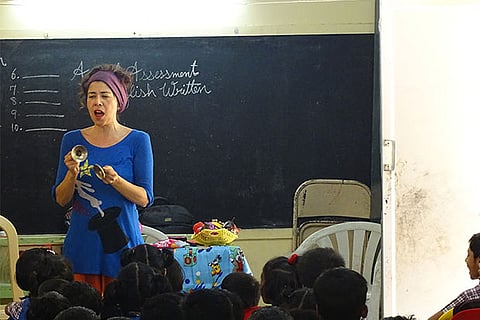 Beatriz interacting with the students