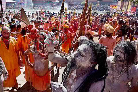 Naga sadhus arrive to take a holy dip in River Shipra